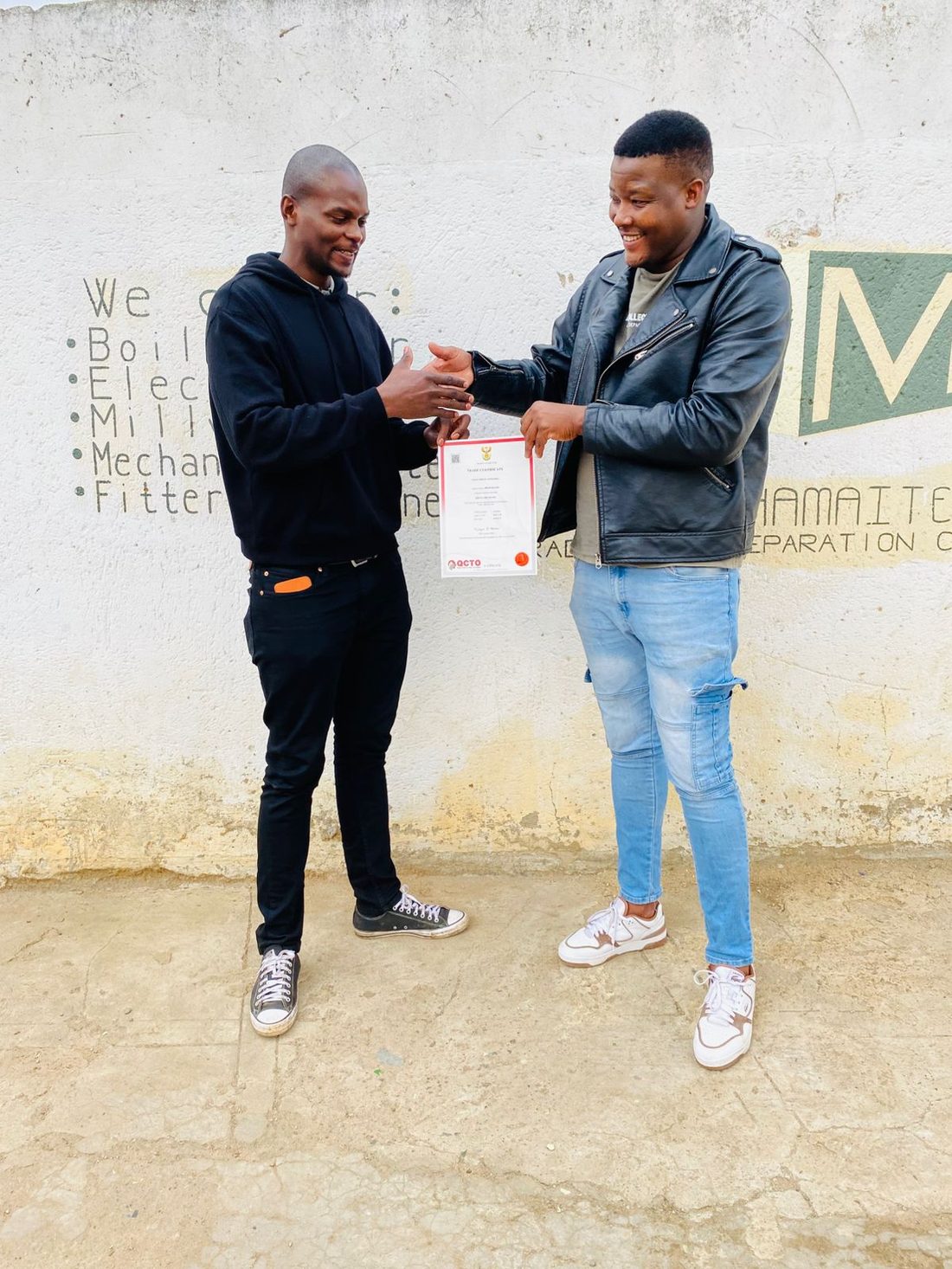 A Mashamaite candidate being congratulated after a successful trade test